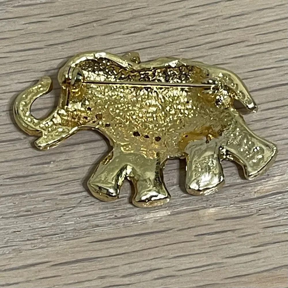Elephant Rhinestones Brooch Gold Tone Green Gem Eye Blue Enamel Saddle Trunk Up